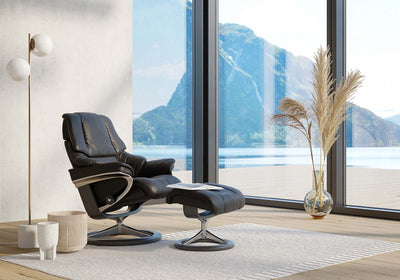 Stressless reno Noblesse Leather Black recliner with Mountains seen through the window GALLERY